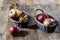 Tasty apples in basket on kitchen table. Autumn season. Wooden t