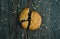 Tasty biscuits on cereal on wood background