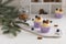 Tasty blueberry muffins with cream on white wooden table, Christmas dessert