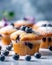 Tasty blueberry muffins sprinkled with powdered sugar on table. Created with generative Ai