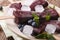 tasty blueberry popsicles on a stick macro on a plate. horizontal