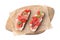 Tasty bruschettas with prosciutto, tomatoes and cheese on white background, top view