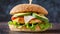 Tasty burger hamburger with chicken meat, avocado and lettuce leaves. Delicious fast food