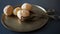 Tasty cheese appetizers on a bronze tray and serving tongs