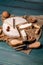Tasty cheese with nuts on linen napkin wooden background copy space cheese knives. National Italian French Camembert or brie