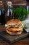 Tasty chicken burger with lettuce, cheese, tomato and pickle. Fast food sandwich with chicken cutlet