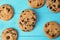 Tasty chocolate chip cookies on wooden background