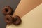 Tasty chocolate donuts on three tone background