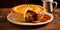 A tasty classic British steak and kidney pie on a plate