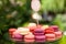 Tasty colorful macaroons on plate