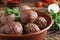 Tasty cooked meatballs with parsley in bowl, closeup