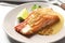 Tasty cooked salmon with mustard on plate