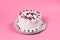 Tasty creamy birthday cake colorful candy adorned