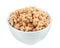 Tasty crispy granola in bowl isolated
