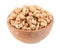 Tasty crispy granola in wooden bowl isolated