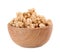 Tasty crispy granola in wooden bowl isolated