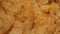 Tasty crispy potato chips background