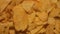 Tasty crispy potato chips background