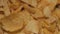 Tasty crispy potato chips background