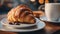 Tasty croissant. Fresh croissant on a table in a cafe. Selective focus. AI generated