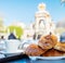 Tasty croissants against fountain