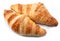 Tasty crusty croissants close-up on a white background