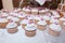 Tasty cupcakes, vanilla cupcakes with pink and white cream