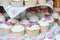 Tasty cupcakes, vanilla cupcakes with pink and white cream