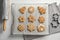 Tasty decorated Christmas cookies on baking table