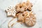 Tasty decorated Christmas cookies with ribbon