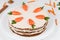 Tasty easter sponge cake with cream and little