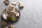 Tasty eastern dessert walnut halva on gray background.