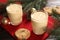 Tasty eggnog, cookies and fir branches on wooden table