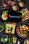 Tasty food with avocado toast, vegetables, eggs on dark background. Helthy breakfast concept