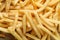 Tasty french fries texture close up