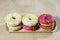 Tasty and fresh donuts on the kitchen table. Cookies, tasty snacks on a wooden table. Table in kuchi.