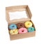 Tasty glazed donuts in cardboard box isolated