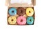 Tasty glazed donuts in cardboard box isolated, top view