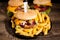 Tasty gourmet delicous burgers on black plate