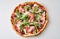 Tasty gourmet Italian pizza with prosciutto