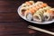 Tasty great colorful set of fresh japanese sushi maki rolls serv