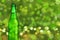 Tasty green beer on color background, space for text. St. Patrick`s Day celebration