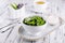 Tasty green dumplings on white bowl
