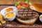 Tasty grilled burger with ingredients. Delicious burger