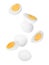 Tasty hard boiled eggs falling on white background