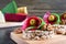 Tasty and healthy canapes with craft cheese, olives, nuts and whole grain bread