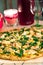 Tasty Healthy Paleo Pizza from Almond Flour with Bottle of Wine, Romantic Evening