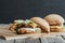 tasty homemade cheeseburgers on baking paper