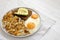 Tasty Homemade Fried Hashbrowns and Eggs on a plate, low angle view. Copy space