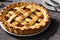 Tasty homemade rustic apple pie with cream